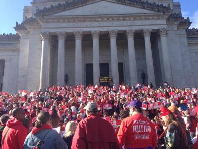 Teachers on the steps at the Capital Building in Olympia, WA on April 25, 2015